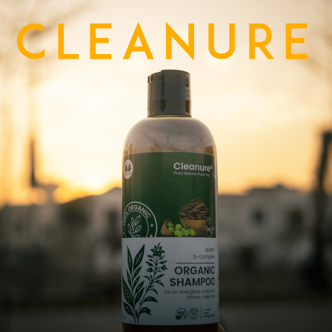 Cleanure organic shampoo bottle with a sunset background
