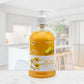 Bottle of 24K Gold Handwash on a marble surface with a blurred indoor background