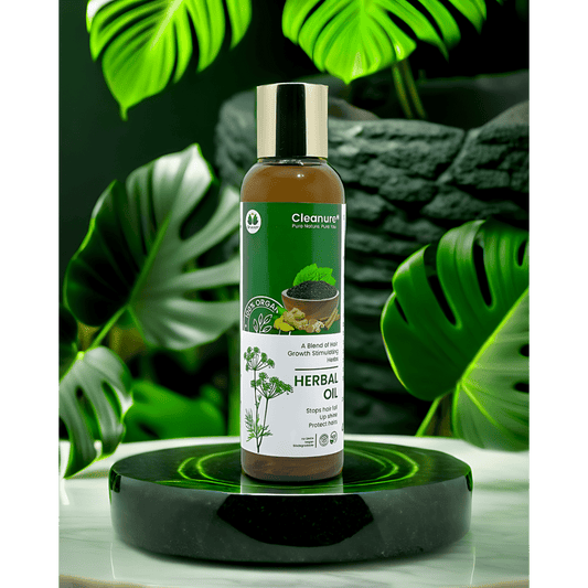 Herbal oil bottle with green leaves in the background