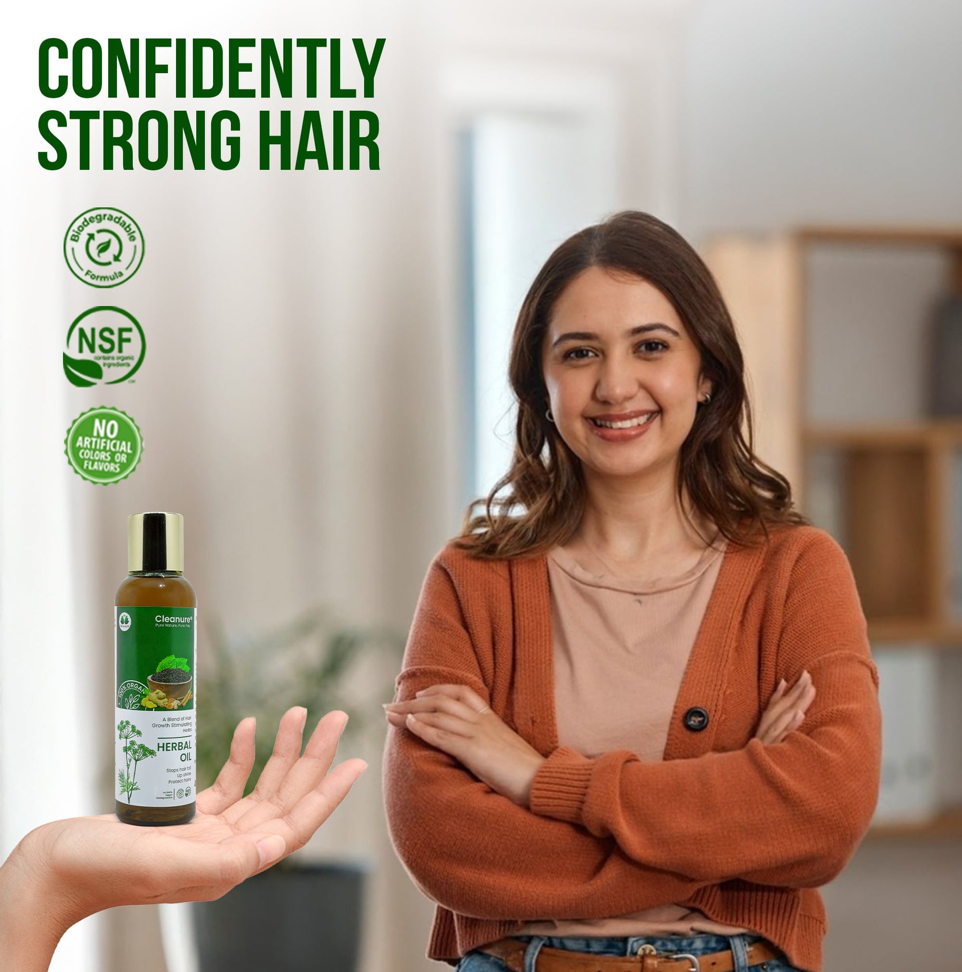 Woman with strong hair holding a bottle of hair care product, with 'Confidently Strong Hair' text and green logos.